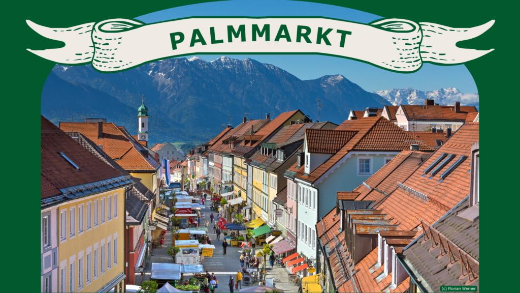 Palmmarkt 2026 - Blick in die Murnauer Fußgängerzone mit Markttreiben. Im Hintergrund das Estergebirge.